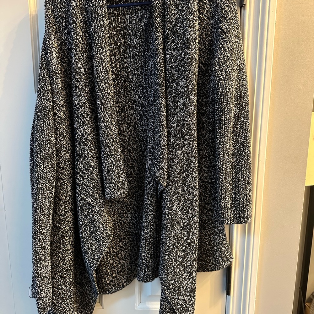 Woman Within Black and White Cardigan